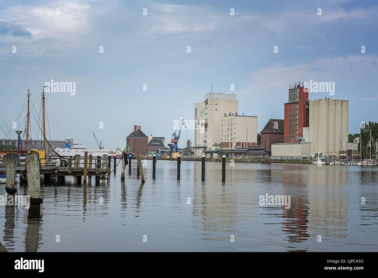 Flensburg, Germany, July 25, 2022:  Industrial city port with the large HaGe building (agricultural cooperative nord) and other silos on the Flensburg Stock Photo