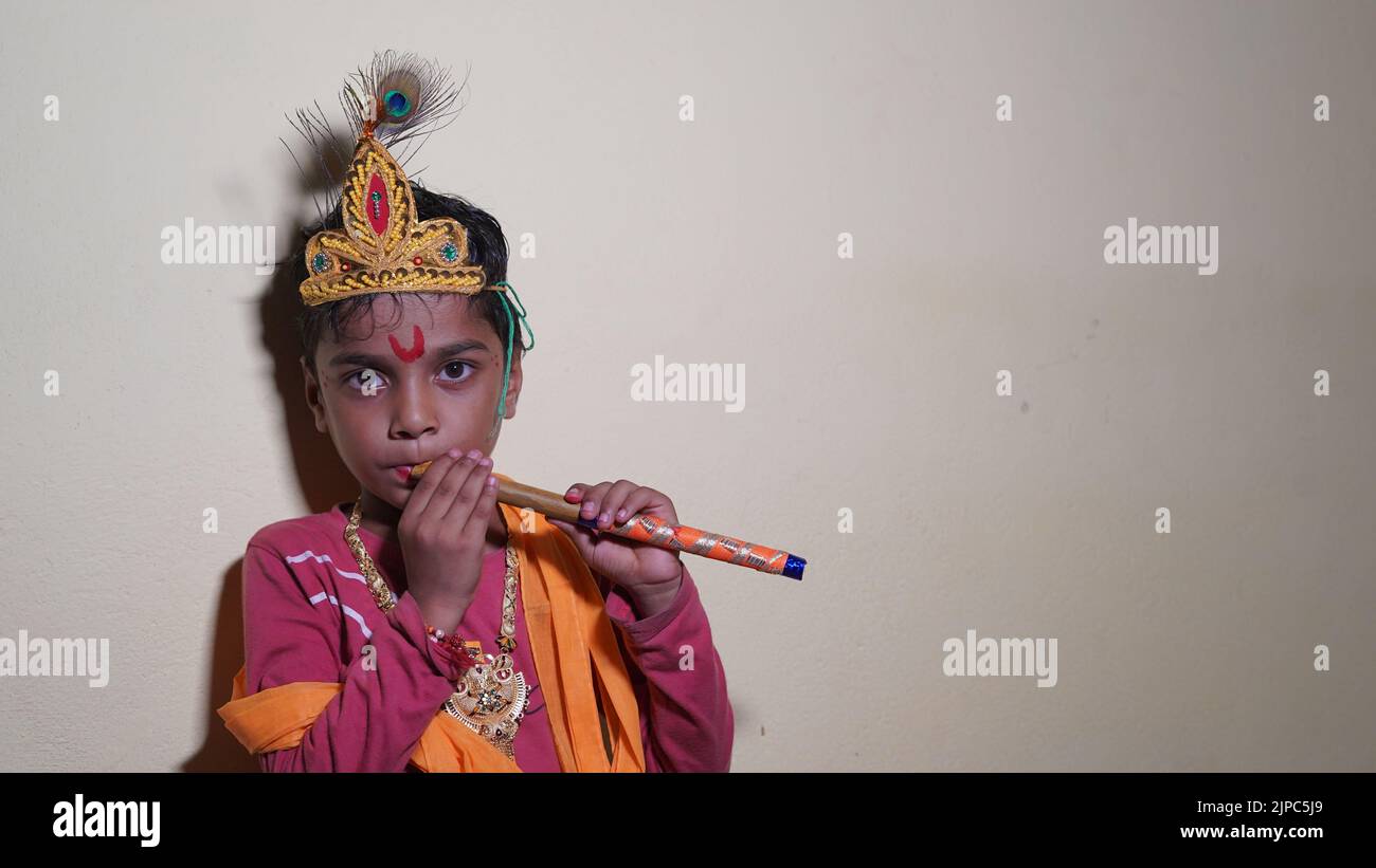 Child dressed as Lord Sri Krishna on the Janmashtami festival or Ashtamirohini day for the procession Stock Photo