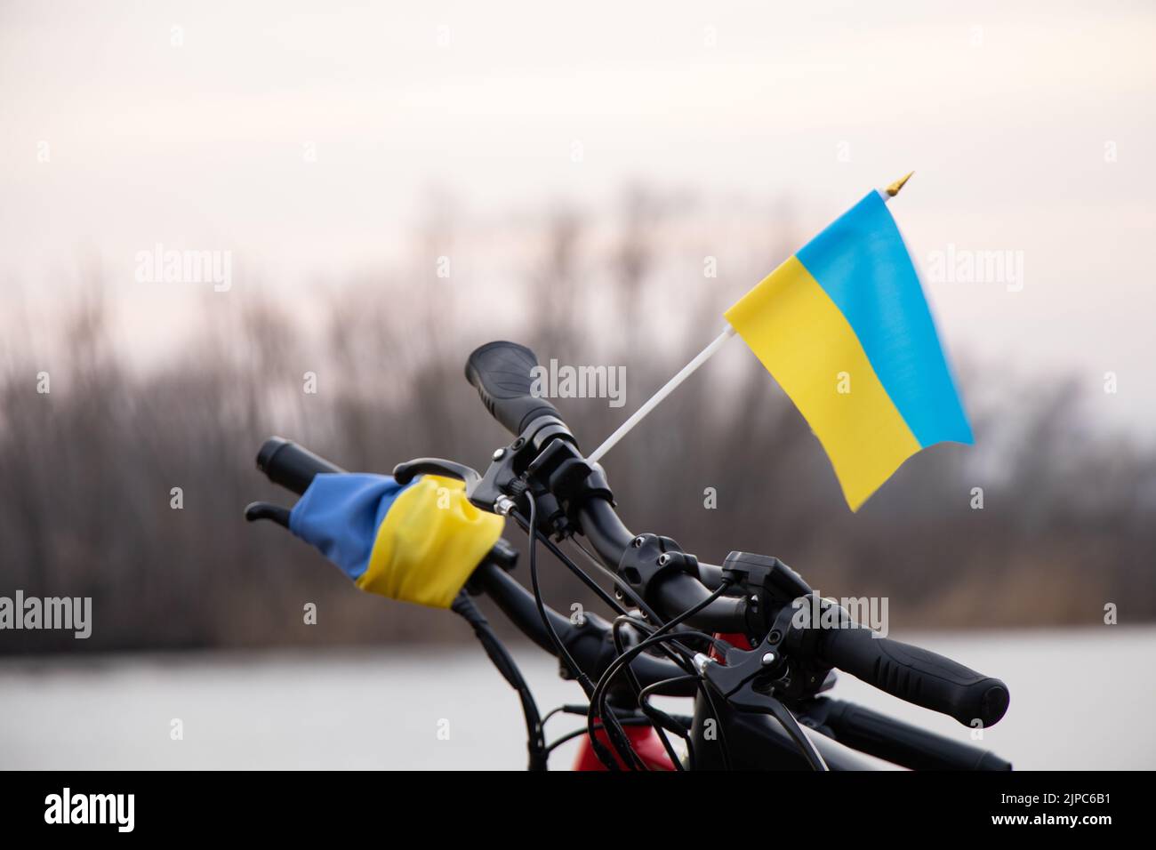 Yellowblue flag of Ukraine on a bicycle in a city in Ukraine, a