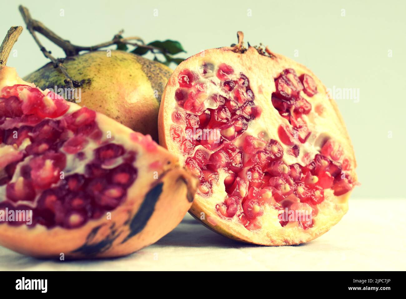 Colourful Yellow and Red Pomegranate Isolated for Wallpaper & Background Stock Photo