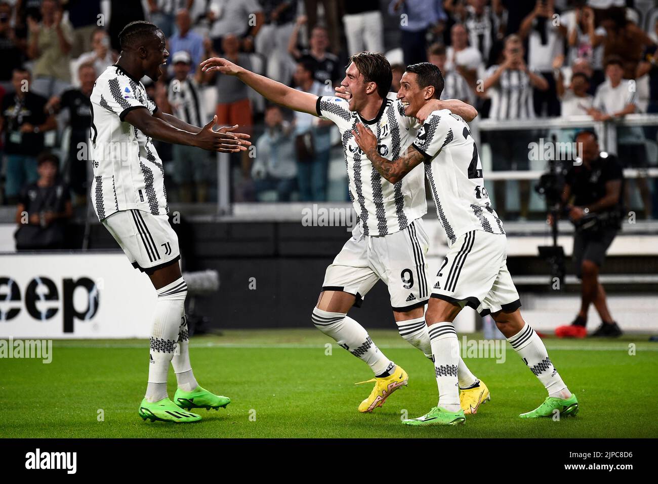 Turin, Italy. 15 August 2022. Dusan Vlahovic of Juventus FC celebrates with Angel Di Maria and Denis Zakaria of Juventus FC after scoring a goal during the Serie A football match between Juventus FC and US Sassuolo. Credit: Nicolò Campo/Alamy Live News Stock Photo