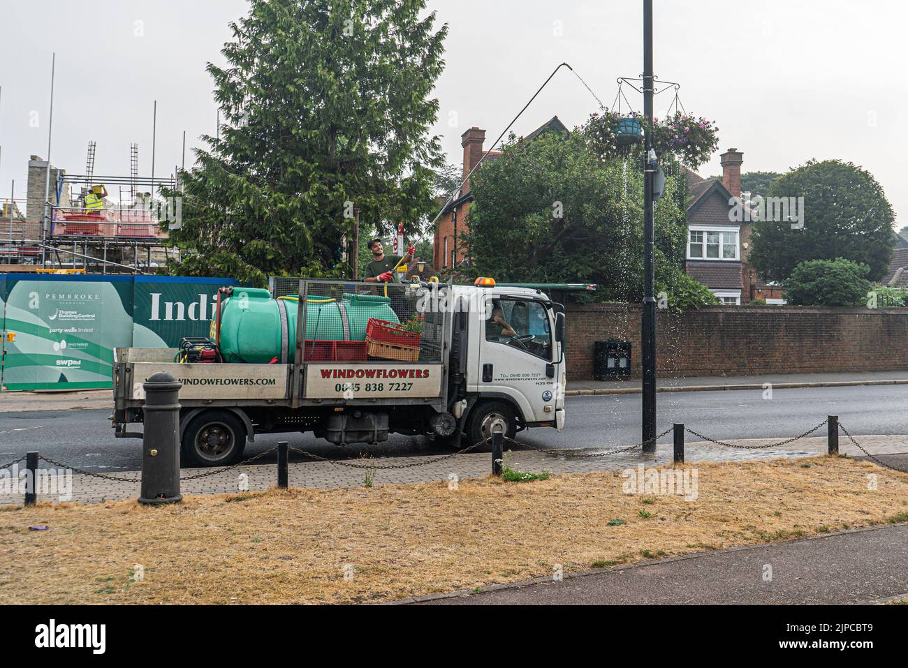 Wimbledon London, UK. 17 August 2022 . Hanging flower baskets are