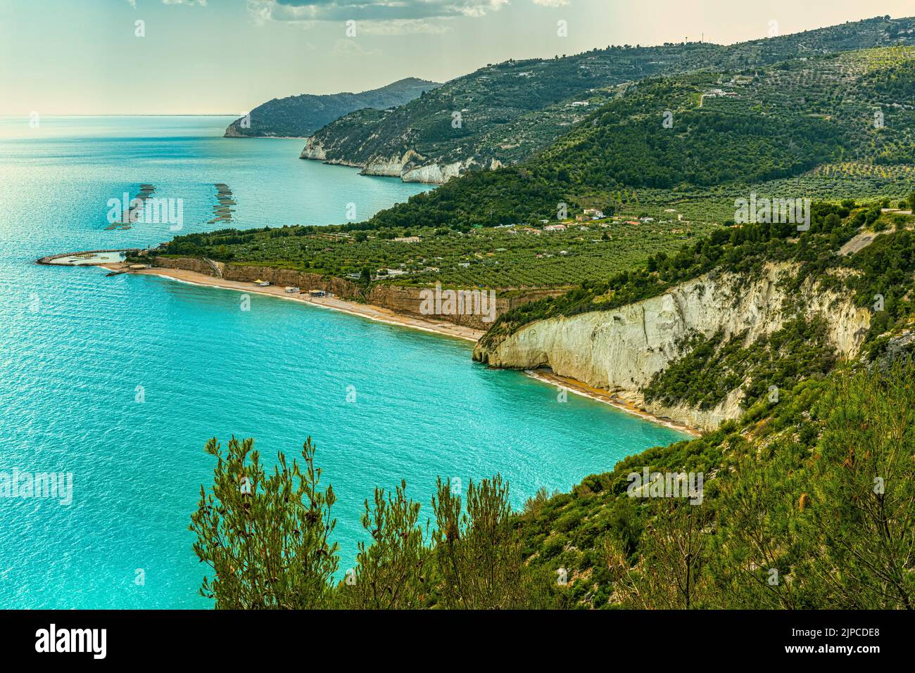 The Mattinatella bay of black stones in the Gargano National Park. Mattinata, Foggia province, Puglia, Italy, Europe Stock Photo