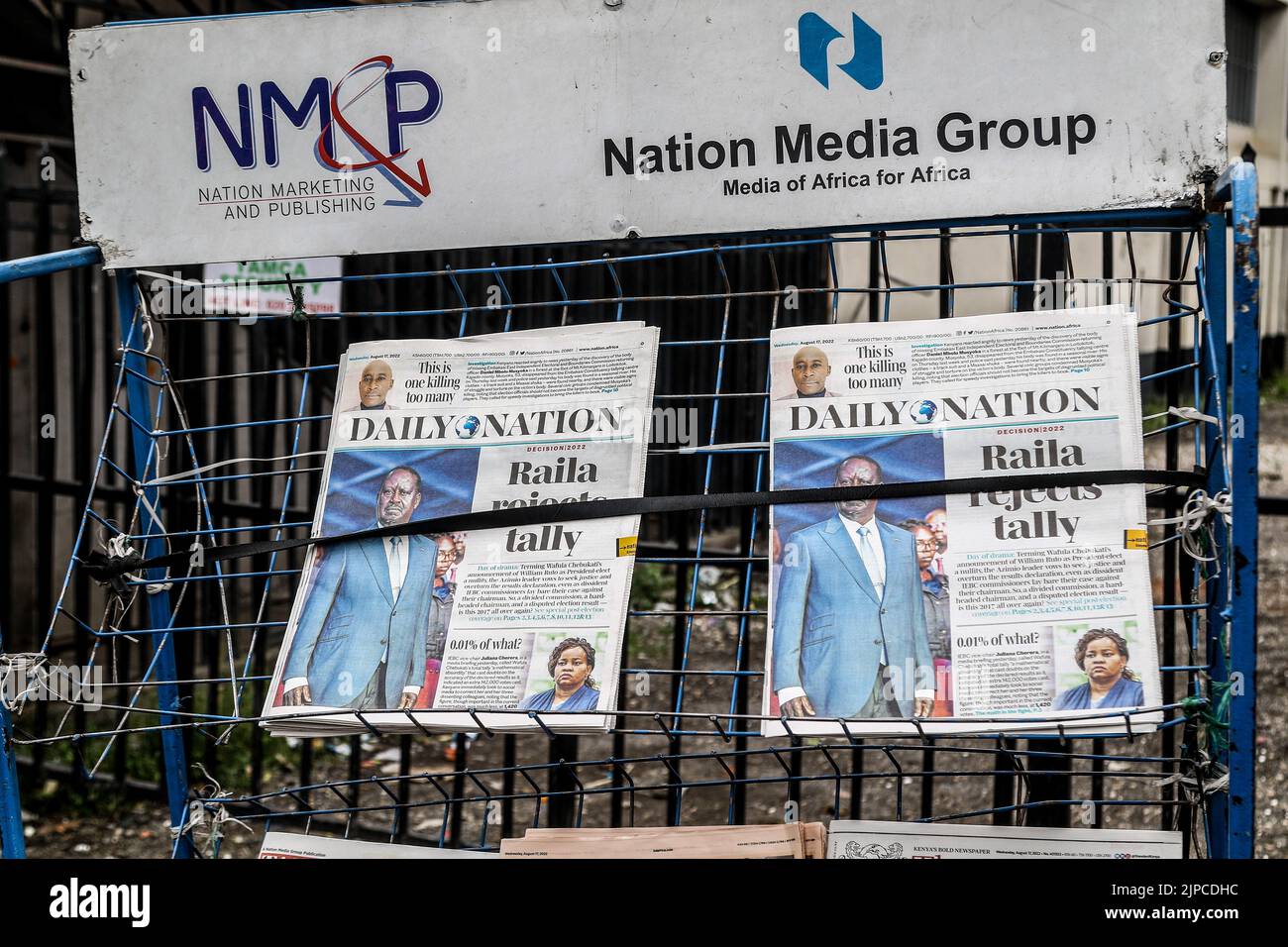 A newspaper stand with newspapers showing the headline of Raila Odinga