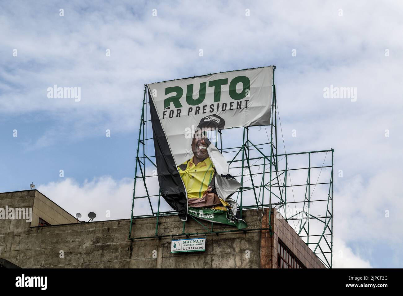 Nakuru, Kenya. 17th Aug, 2022. The banner bearing the image of President-elect, William Ruto, is torn from the top of a building in Nakuru Town. The Independent Electoral and Boundaries Commission (IEBC), declared William Ruto as the newly elected president of the Republic of Kenya in a hotly contested race, his main challenger, Raila Odinga rejected the election outcome, terming the president-elect, a nullity. Credit: SOPA Images Limited/Alamy Live News Stock Photo