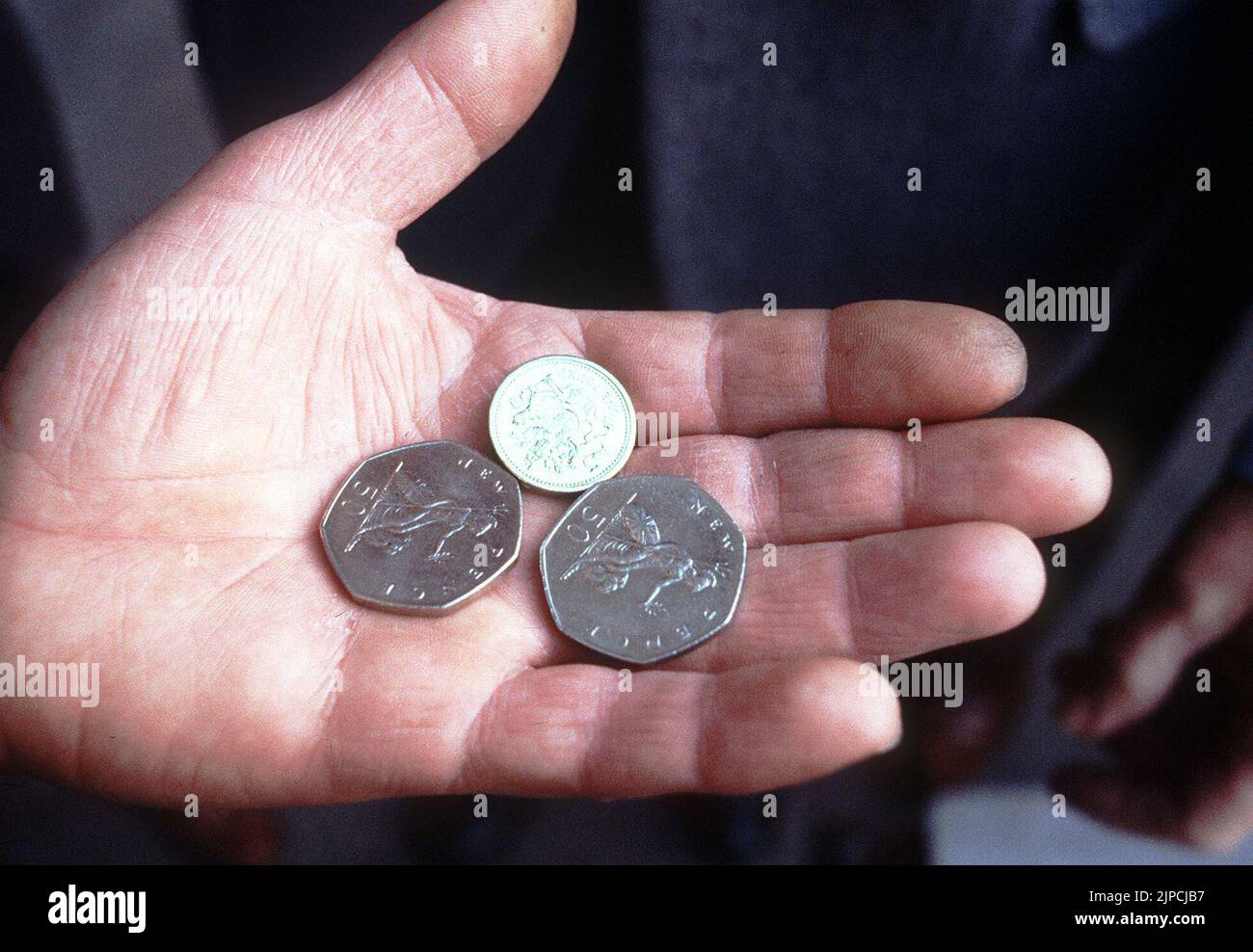 File photo dated 10/02/82 of the Royal Mint unveiling the new one pound coin, shown in comparison to the 50 pence piece. Consumer Prices Index (CPI) inflation reached 10.1 percent last month, the biggest jump in the cost of living since February 1982, when CPI reached 10.4 percent, according to estimates. Issue date: Wednesday August 17, 2022. Stock Photo