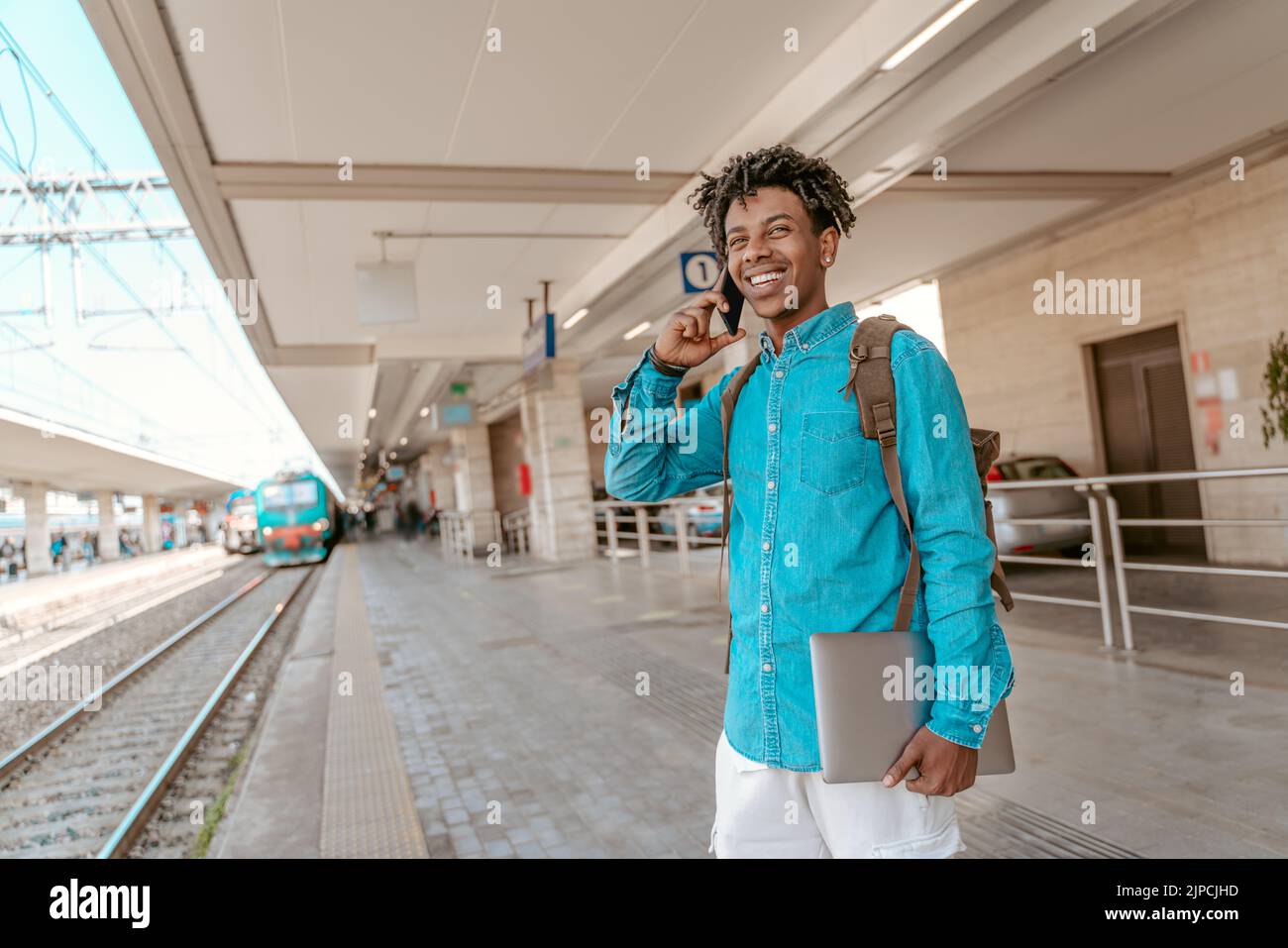Man waiting train on weekend hi-res stock photography and images - Alamy