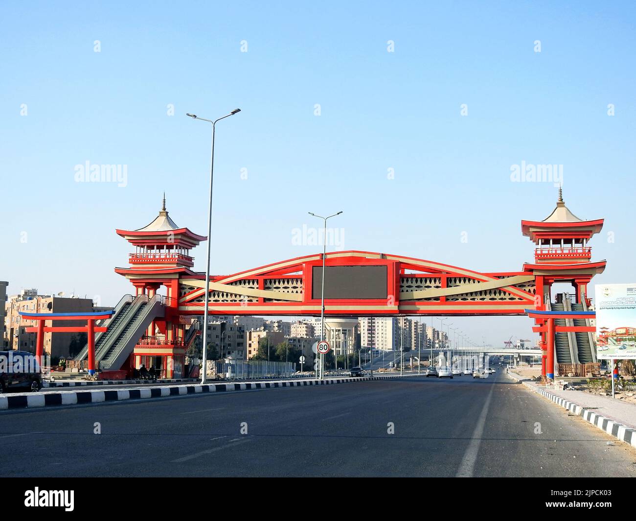 Cairo, Egypt, July 31 2022: Shinzo Abe axis patrol highway in Egypt with a pedestrian bridge finished in traditional Japanese architectural style, the Stock Photo