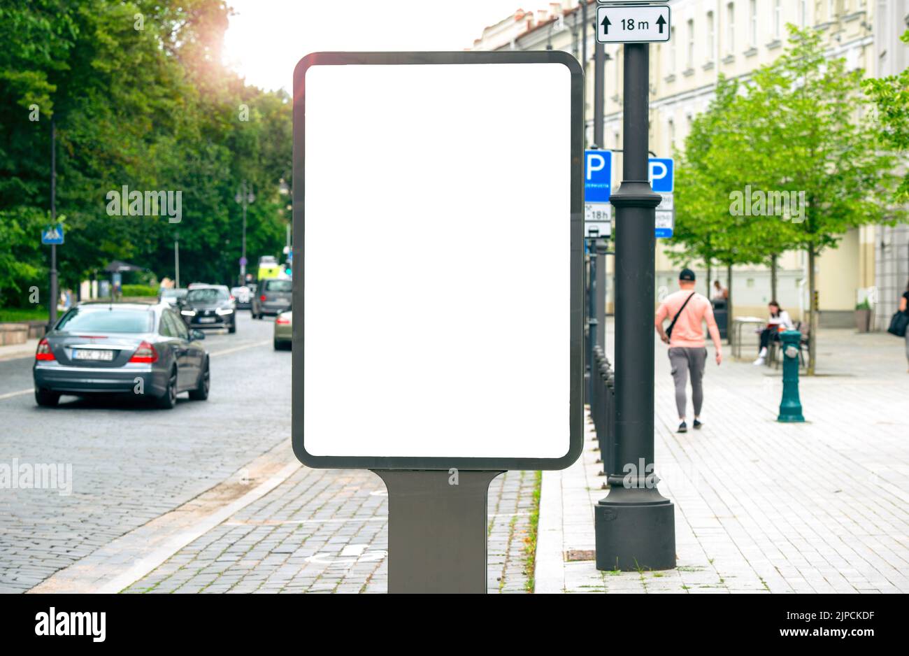 Vertical blank screen of billboard in a city street Stock Photo