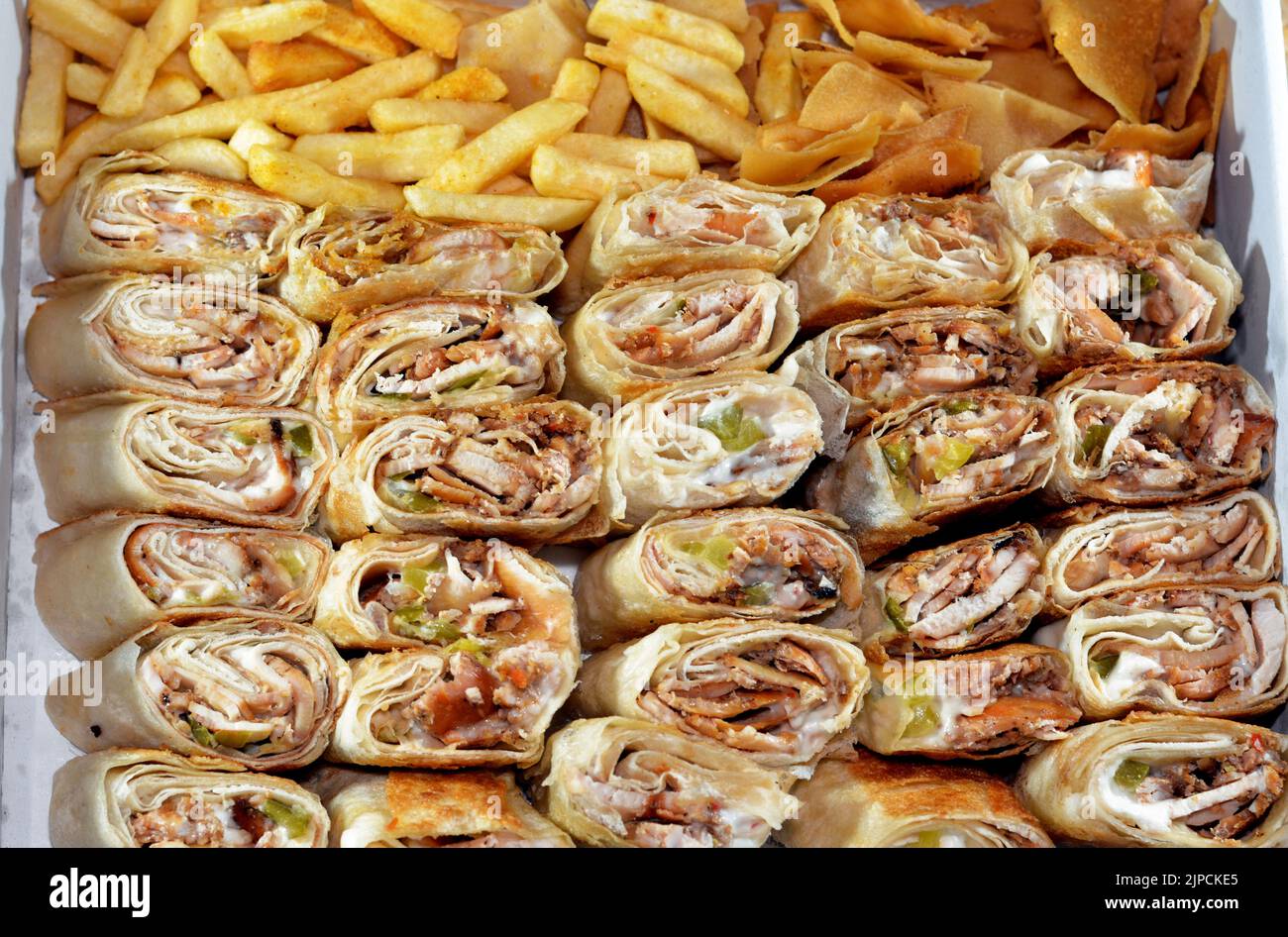 Syrian recipe cuisine background, a box full of pieces of chicken