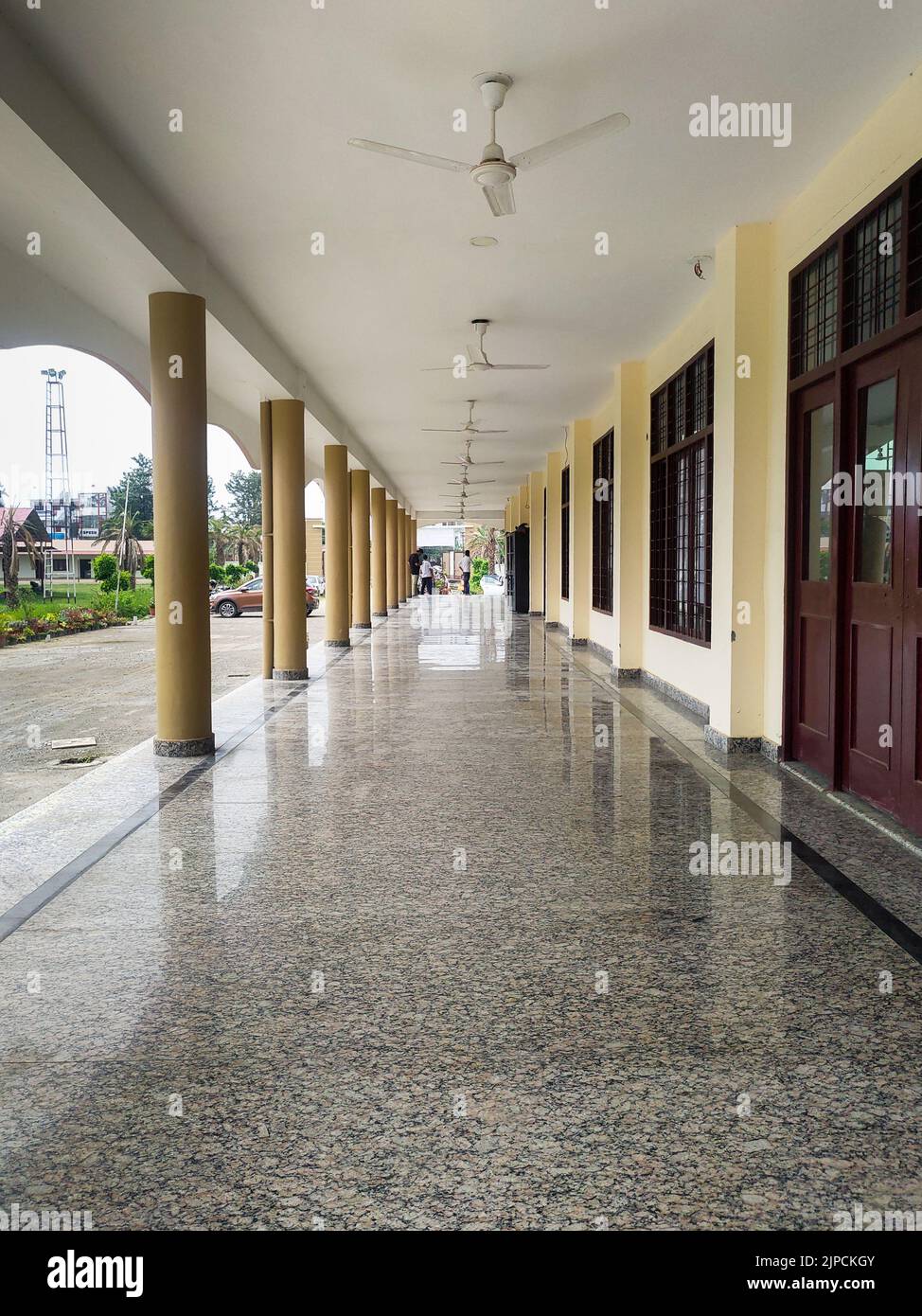June 24th 2021 Dehradun India. A long modern open corridor with pillars of a large government building in India. Stock Photo