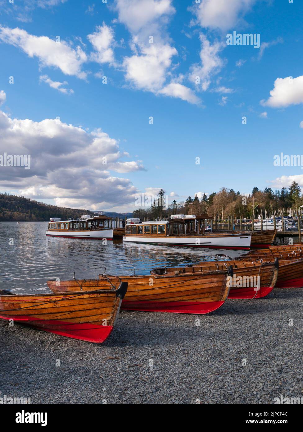Rowing boats on the shore of Lake Windermere. BownessonWindermere
