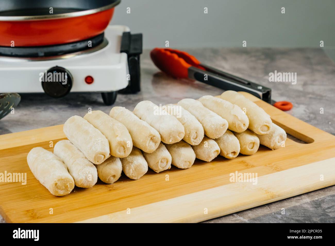 Raw tequeños ready to cook, typical Venezuelan snack at parties Stock Photo