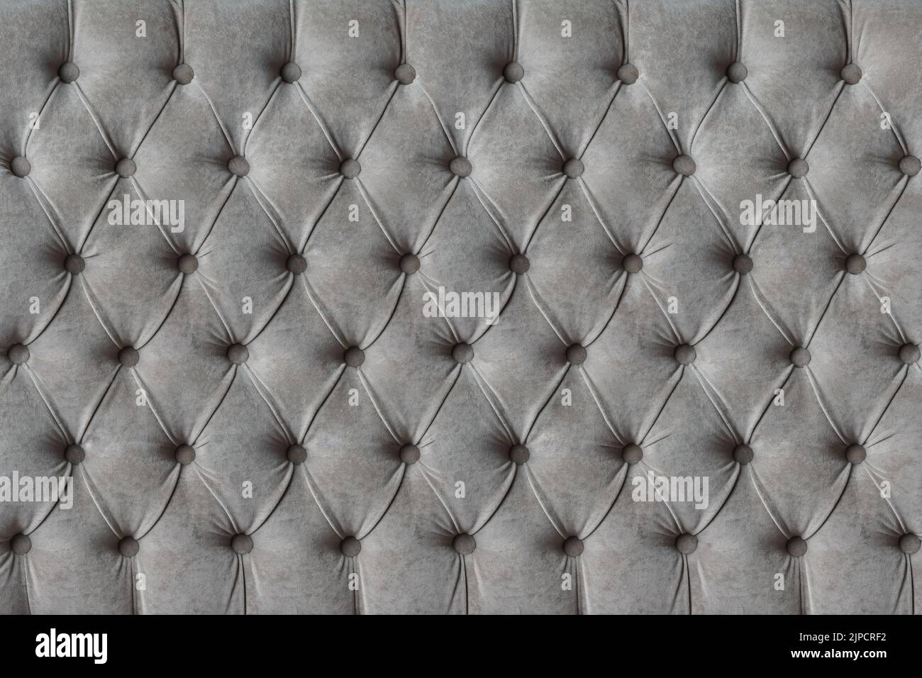 Gray capitone checkered soft fabric textile decorative background with