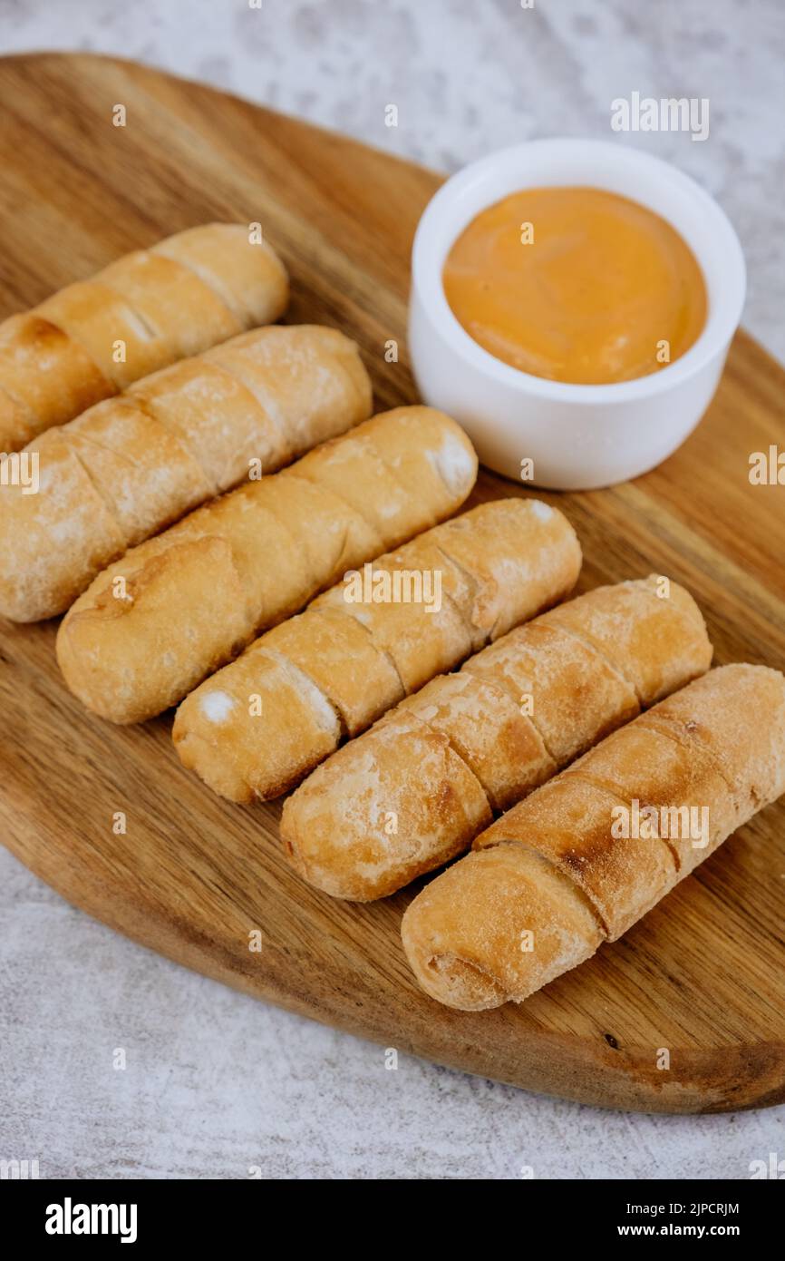 Fried tequeños, fingers stuffed with salty artisanal cheese, typical Venezuelan and Latin American food Stock Photo