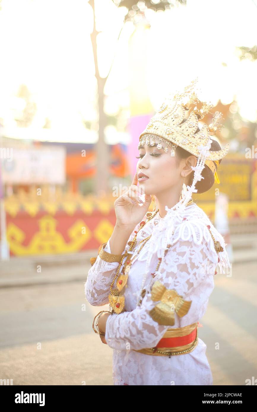 Beautiful portrait young asian woman wearing traditional Indonesian