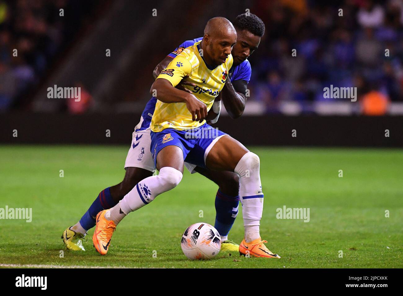Zaine Francis-Angol of Oldham Athletic tussles with Rhys Browne of Wealdstone Football Club during the Vanarama National League match between Oldham Athletic and Wealdstone at Boundary Park, Oldham on Wednesday 17th August 2022. (Credit: Eddie Garvey | MI News) Credit: MI News & Sport /Alamy Live News Stock Photo