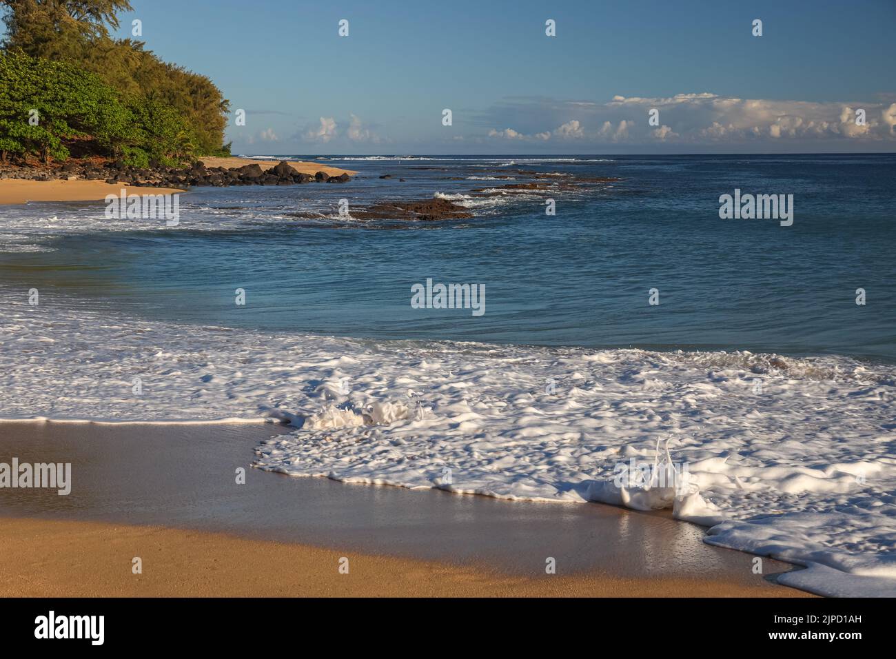 Foamy sea waves at sandy beach hi-res stock photography and images - Alamy