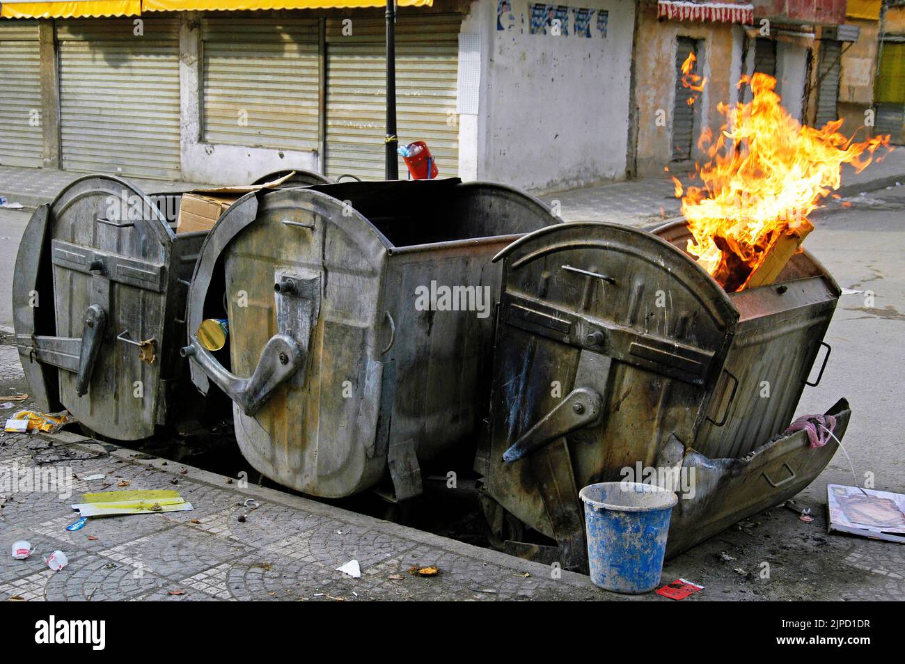 Burning rubbish skip, Tirana, Albania Stock Photo