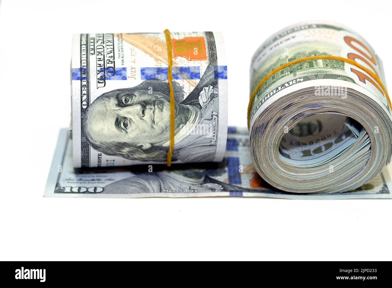 Bundles of money rolls of dollars isolated on white background, stack