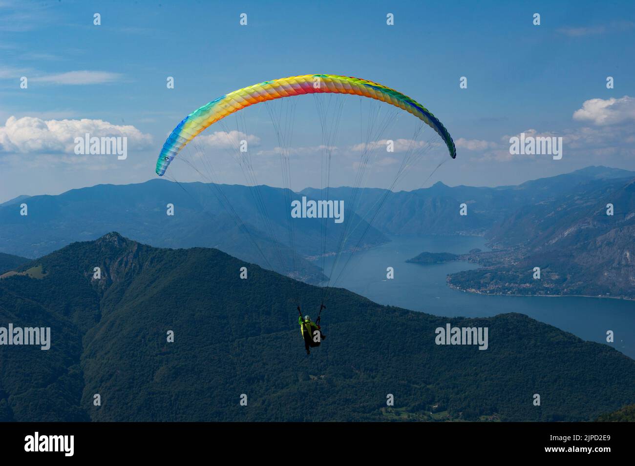 2022 august 11 - Europe, Italy, Lombardia, province of Lecco, Valsassina, Taceno, tandem and single paragliding school at Alpe Giumello in upper Valsa Stock Photo