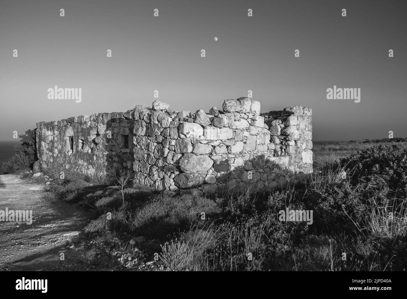 Abandoned house on the coast of Milos Island, Cyclades, Greece Stock