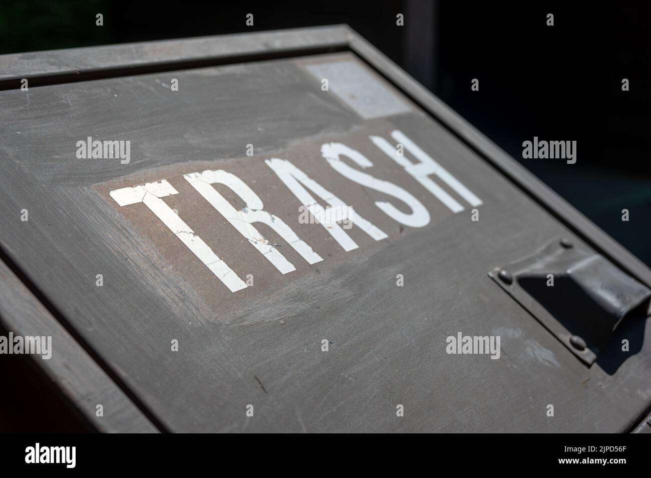 Closed lid of a bear proof trash can with a covered latch.  Stock Photo