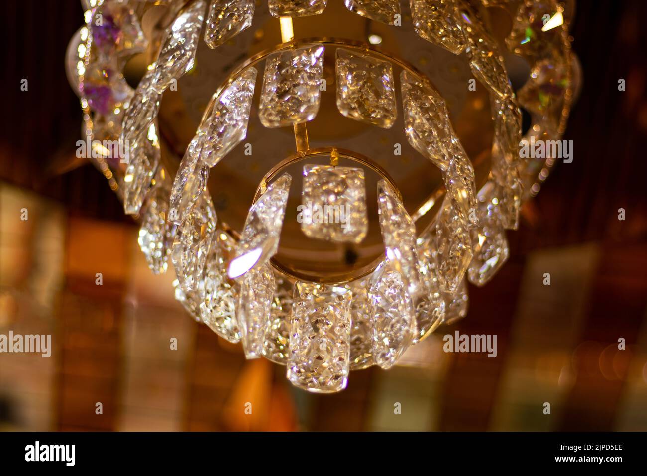 A colorful chandelier has been an ideal solution to not only light your living room or dining room but also to add class and elegance to your home. Stock Photo