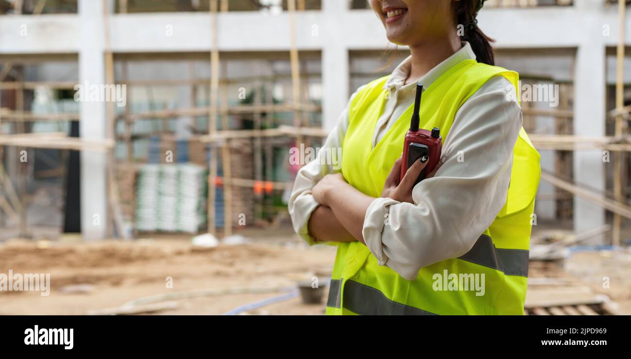 Engineers are checking the quality at the outdoors construction site Stock Photo