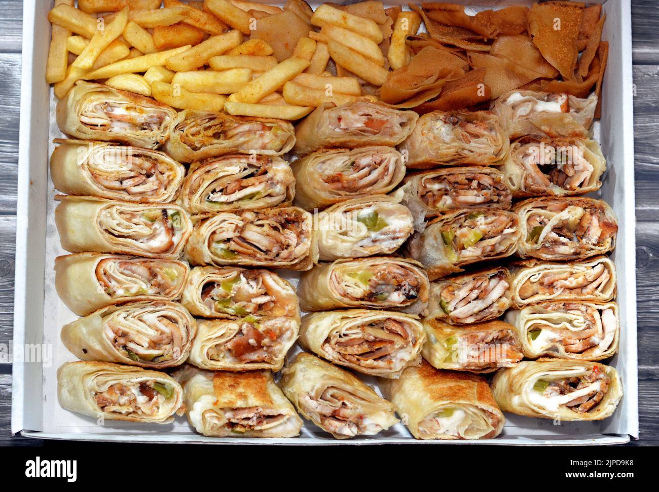 Syrian recipe cuisine background, a box full of pieces of chicken