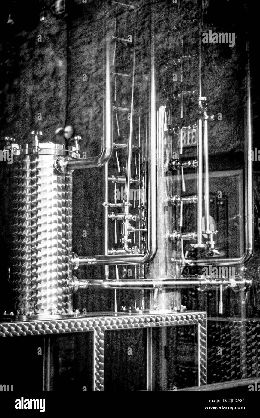 A vertical shot of glass distill copper pipe Stock Photo