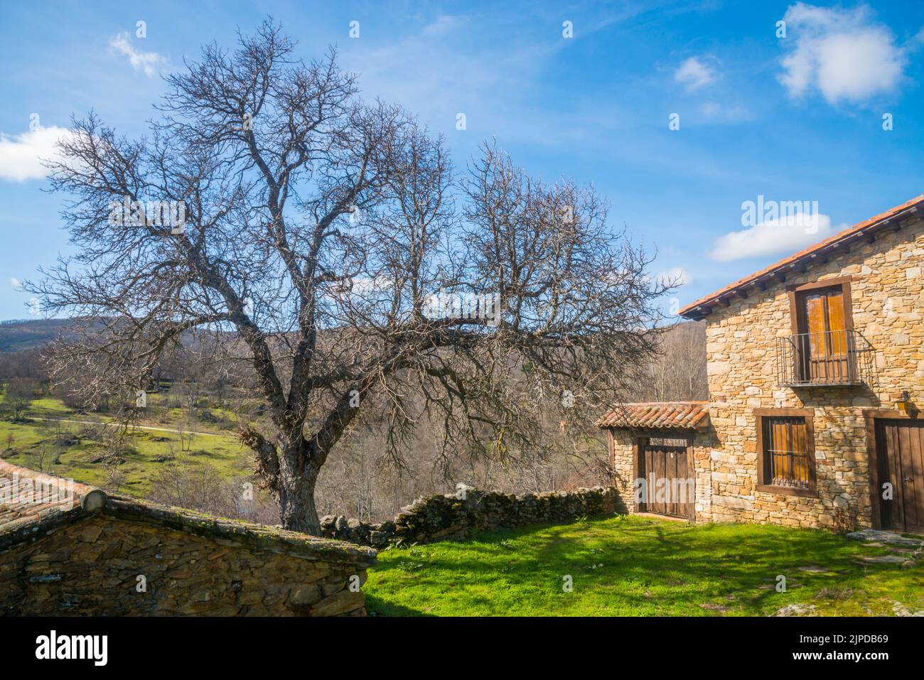 House and landscape. Horcajuelo de la Sierra, Madrid province, Spain. Stock Photo