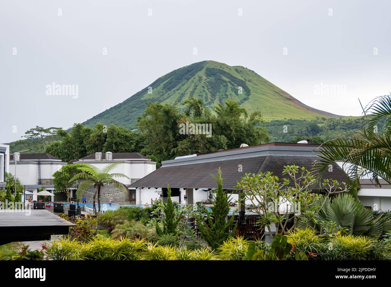 View from a hotel room of the Mount Lokon, or Gunung Lokon, an active volcano near Tomohon, North Sulawesi, Indonesia. Stock Photo