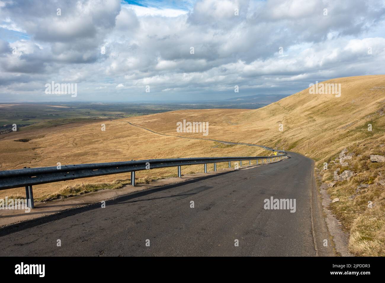 Landscape looking down Lamps Moss famous cycling hill on the B6270 road above Nateby, Yorkshire Dales National Park, England, UK Stock Photo