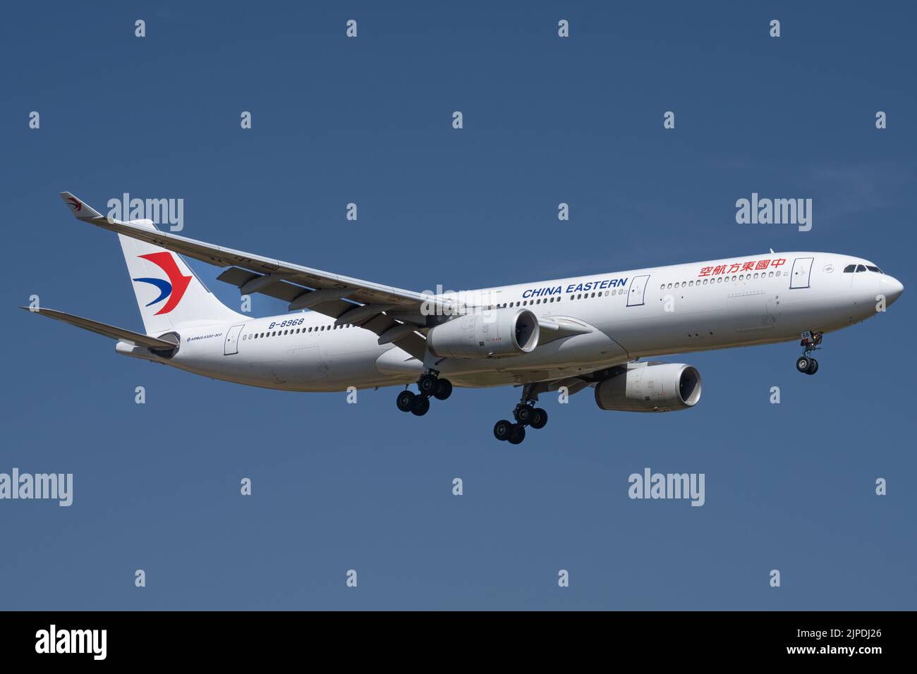Airbus A330-300 (B-8968) of China Eastern Airlines Lands at London Heathrow Stock Photo