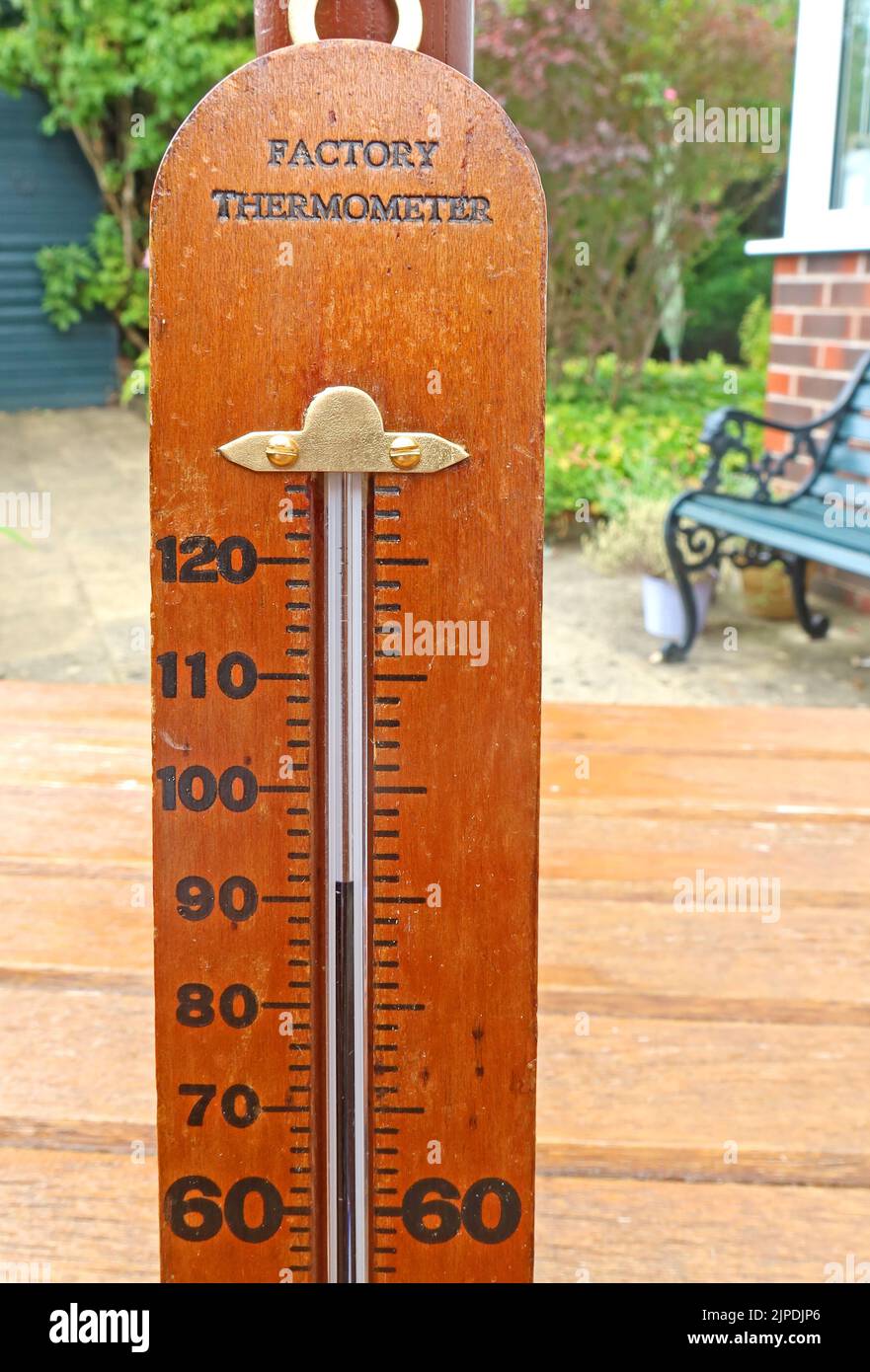 Traditional Factory Thermometer, showing a temperature of over 90 degrees Fahrenheit, caused by warming & climate change? Stock Photo