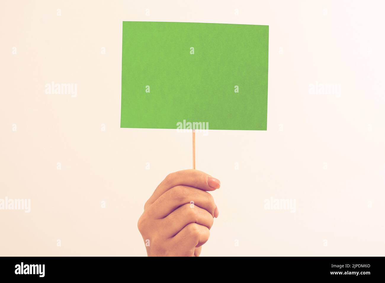 Man Showing Recent Informations On Notebook On Desk With Notes And Pencils. Businessman Presenting Important Message On Notepad On Table With Memos. Stock Photo