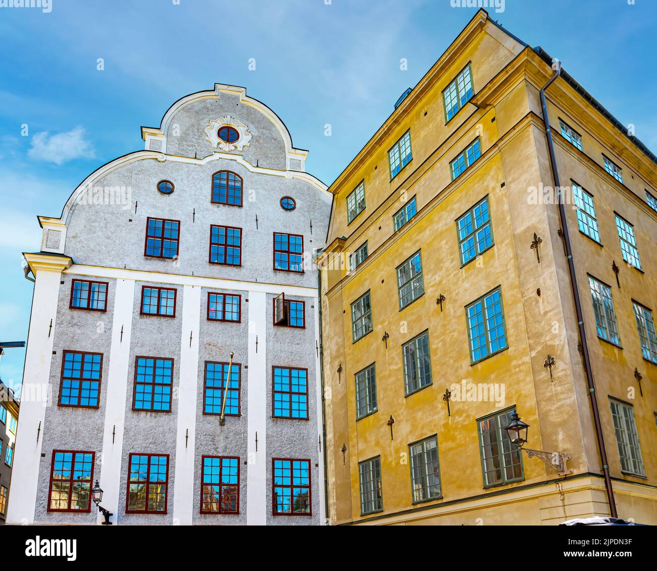 STOCKHOLM, SWEDEN - JULY 31, 2022: This cobblestone plaza dating back to the Middle Ages has colorful historic buildings Stock Photo