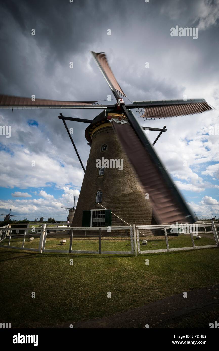 Sails in motion on classic Dutch windmill at Kinderdijk Stock Photo