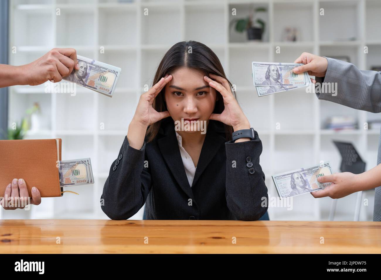 Asian woman refusing money in the envelope to agreement contract, Bribe and corruption concept Stock Photo
