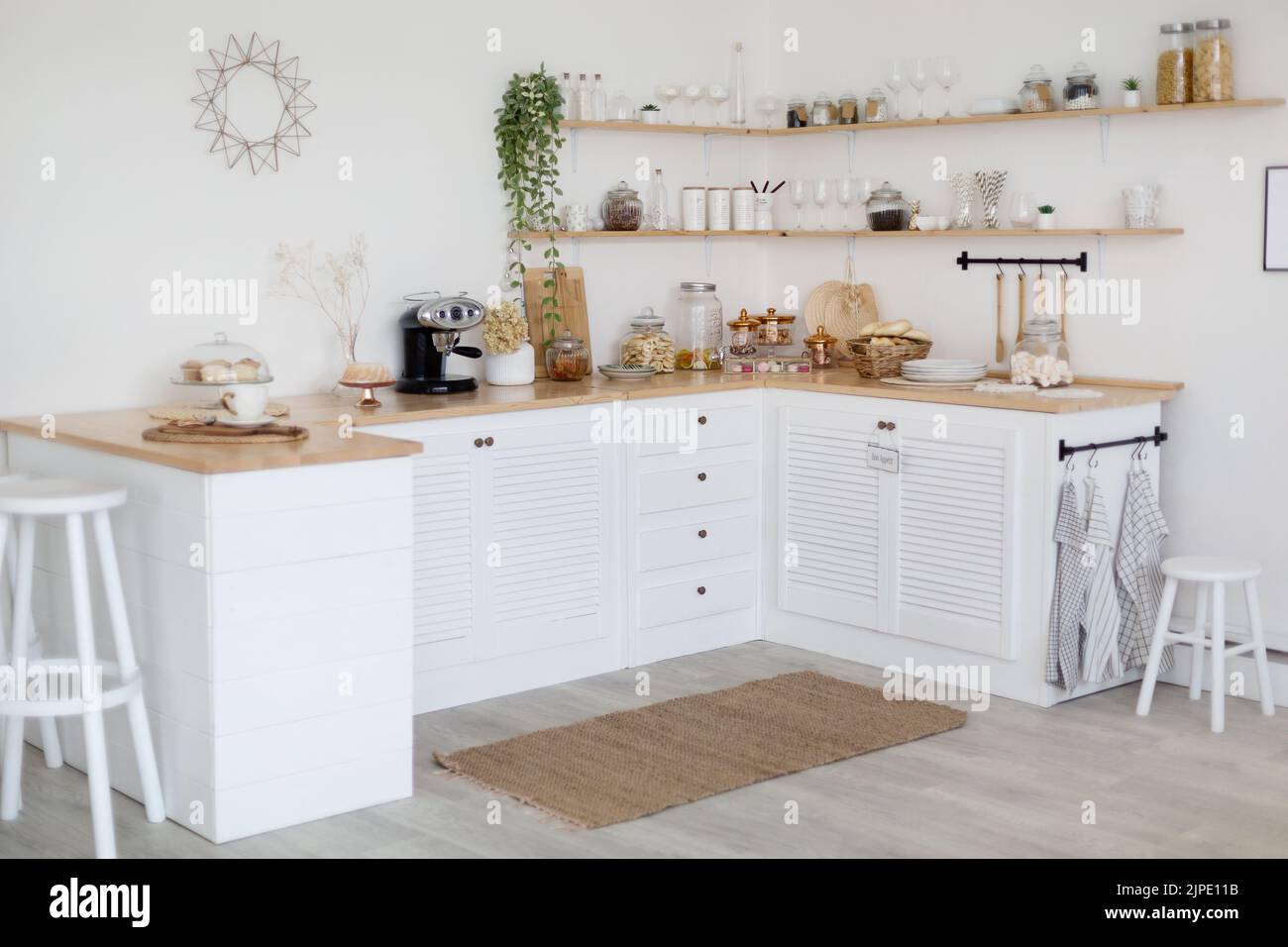 Cozy white kitchen interior made in rural style Stock Photo Alamy