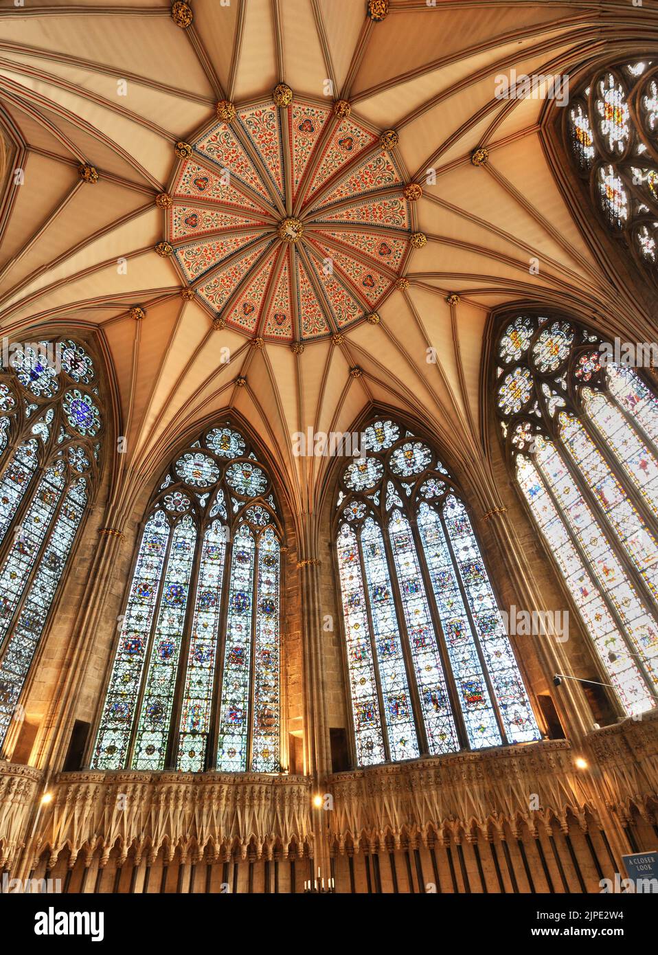 York Minster Chapter House, showing amazing ceiling and stained glass windows Stock Photo