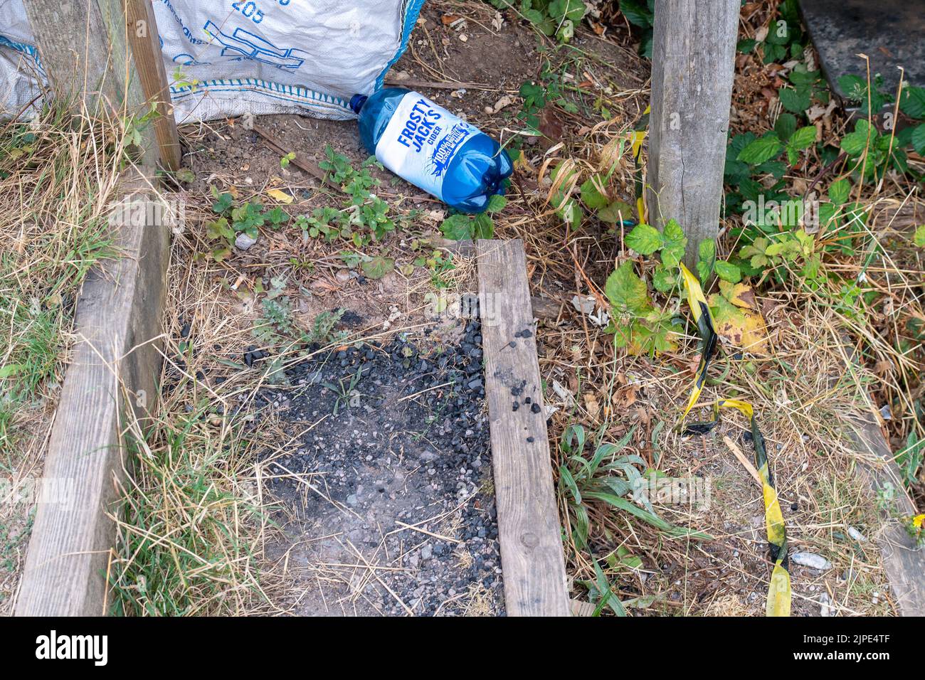 Slough, Berkshire, UK. 17th August, 2022. The remains of another BBQ next to the Jubilee River in Slough. The fire service have warned people about lighting fires as the countryside remains tinder dry following weeks with no rain and two heatwaves. Credit: Maureen McLean/Alamy Live News Stock Photo