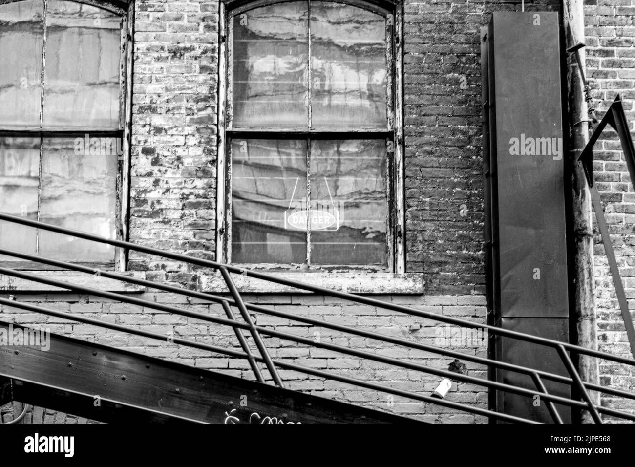 A grayscale shot of an old city building Stock Photo