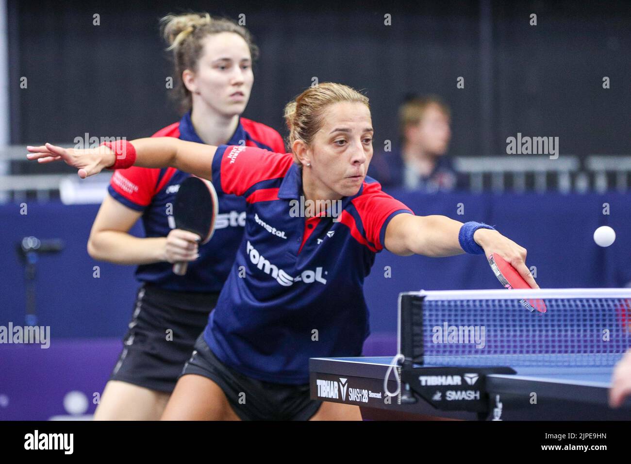 Munich, Germany. 17th Aug, 2022. Table Tennis; European Championship, Quarterfinals; Doubles, Women, Samara (Romania) and Dragoman (Romania) against Matelova (Czech Republic) and Balazova (Slovakia): Andreea Dragoman (hl) and Elizabeta Samara in action. Credit: Christian Kolbert/dpa/Alamy Live News Stock Photo