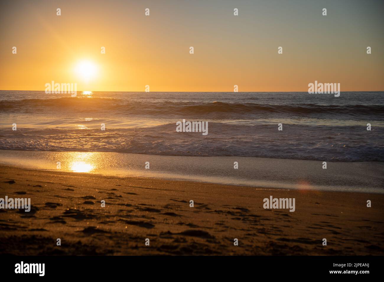 An empty beach as the sun sets in Sayulita, Mexico Stock Photo