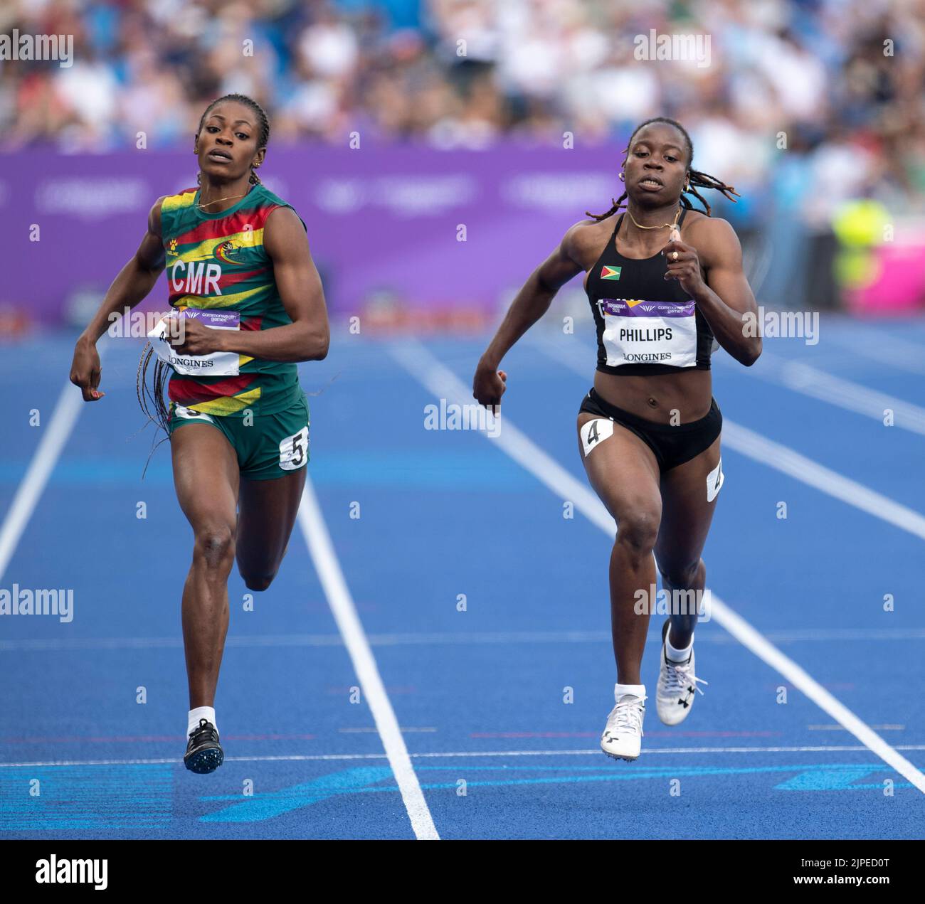 Linda Angounou and Kenisha Phillips competing in the women’s 200m heats at Commonwealth Games at Alexander Stadium, Birmingham, England, on 4th August Stock Photo