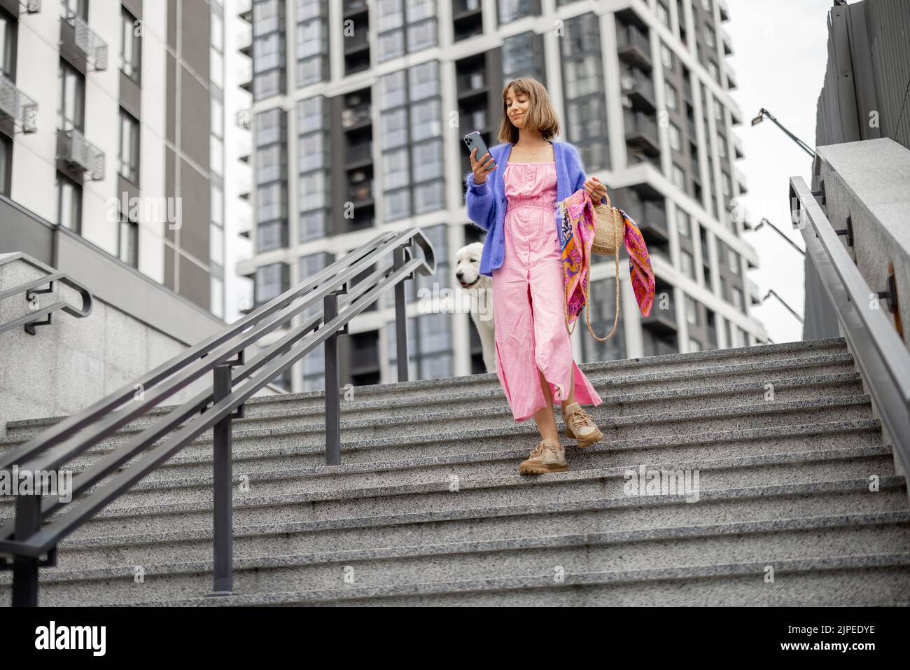 Smiling young woman walks hi-res stock photography and images - Alamy