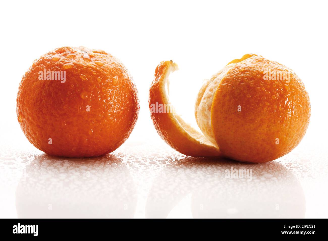 clementine, peeling, clementines Stock Photo Alamy