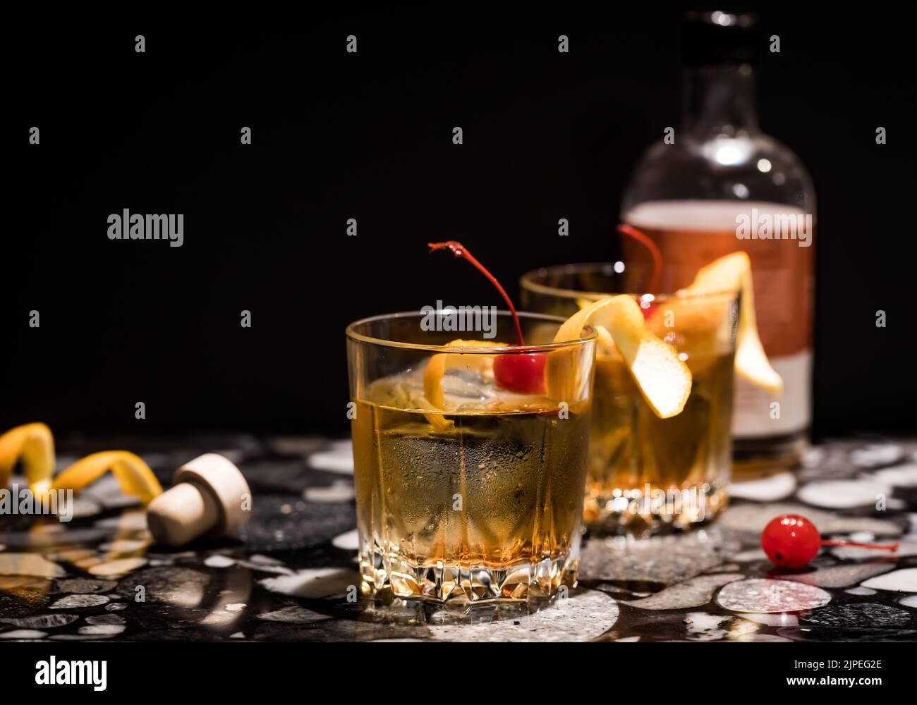 old-fashioned-drinks-against-a-black-background-selective-focus-on